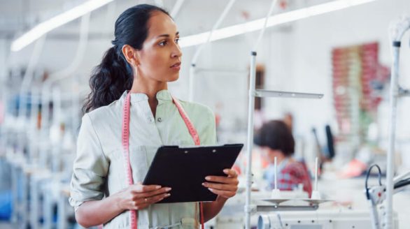 woman clipboard measuring garments